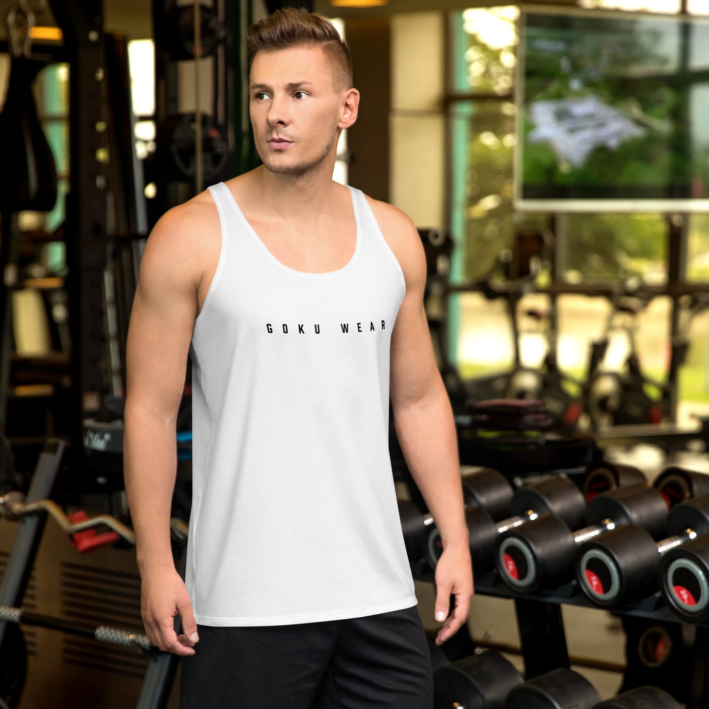 Athlete wearing the Goku Conquer Tank Top during a workout, showcasing its flexible and stylish design. Front Pose