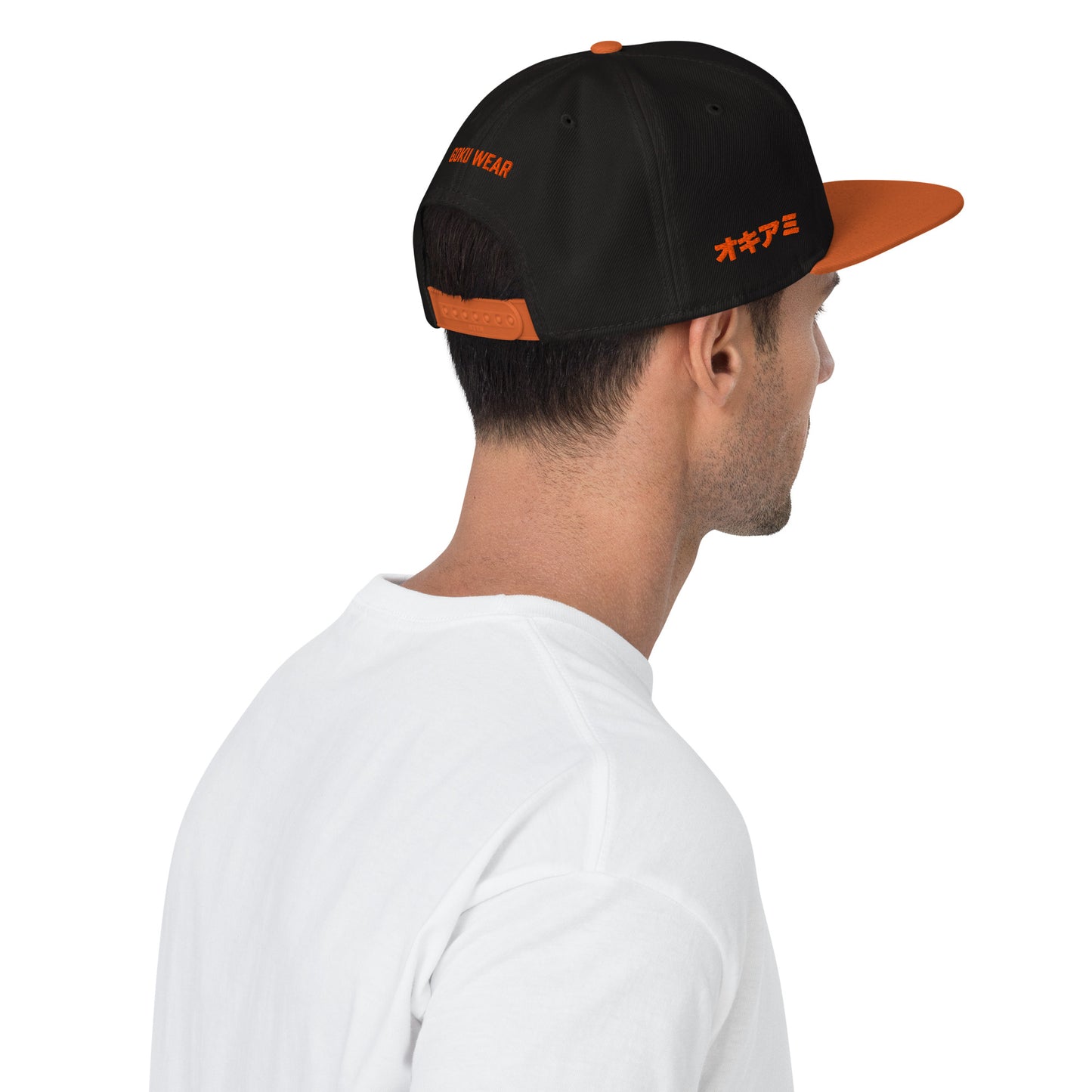 Anime fan wearing the Krillin Snapback Hat, showcasing bold Dragon Ball-inspired design.